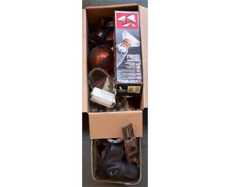 A box of vintage car lights and bulbs etc, along with a box of towing hitches