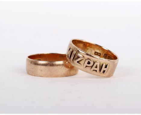 A 9ct gold Mizpah ring, stamped 375 with full Birmingham hallmarks, ring size K 1/2; and a 9 carat gold ring, stamped 375 wit