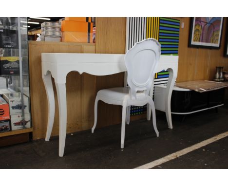 A modern laminate white desk, with a matching office chair.Chair 44cm(W) x 44cm(D) 96.5cm(H)Console 135.5cm(L) 40.5cm(D) 81cm