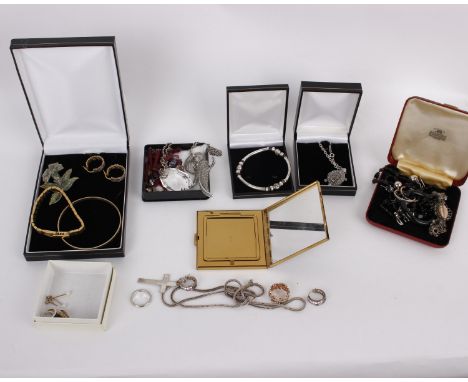 A collection of costume jewellery, to include an Volupte USA compact, silver earrings 925, necklaces; rings; bracelets; and o