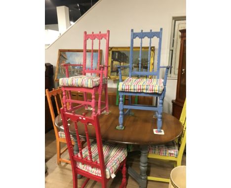 ERCOL OVAL OAK EXTENDING DINING TABLE AND 6 PAINTED CHAIRS