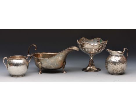 Silver sauce boat in the Georgian style with flying loop handle, together with a silver bon bon dish with pierced decoration,