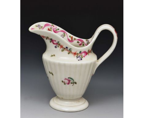 New Hall cream jug circa 1790-1800, pattern 186, fluted body and conical shape, decorated in polychrome enamels of pink ribbo