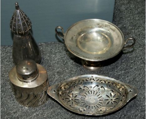 Silver comport London 1924, a silver pierced dish, a stylised silver sugar sifter with makers mark KHS and a silver lidded fl