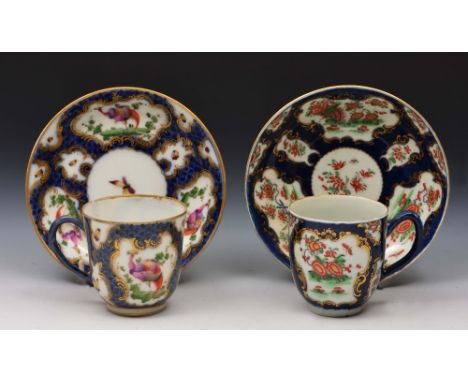 Two Worcester cups and saucers late 18th Century, each decorated in polychrome enamels of flowers and exotic birds on blue gr