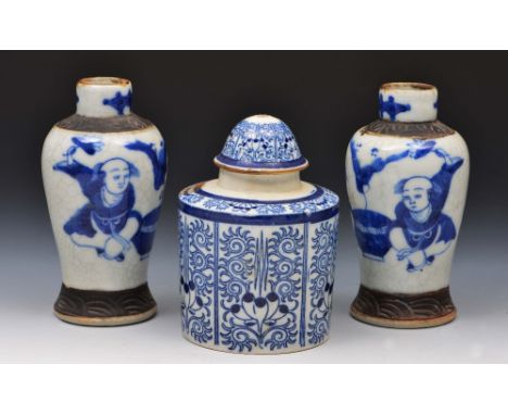 English blue and white pottery cylindrical tea caddy and cover, 19th Century, 11cm and a pair of small Chinese crackleware va