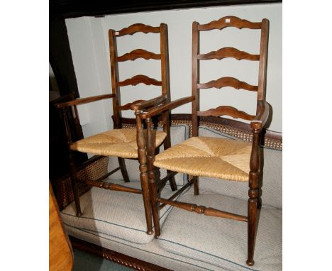 Pair of beech ladder back armchairs with rush seats