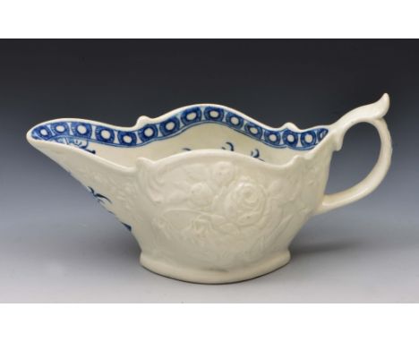 Worcester blue and white sauce boat circa 1765-1770, decorated underglaze peony pattern, the outside of the boat with moulded