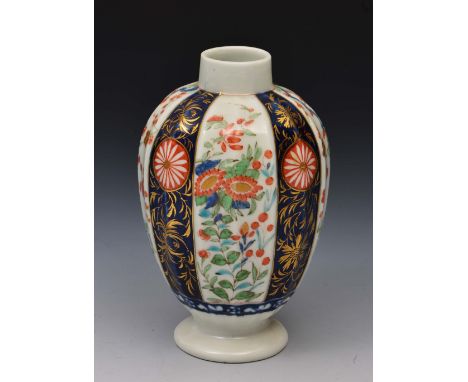 Worcester tea caddy circa 1765, of fluted design, decorated in polychrome enamels with a Japanese style pattern, blue square 