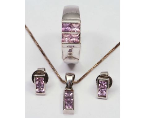 Suite of 18ct white gold jewellery comprising a pendant and chain, a pair of earrings and a ring, all with pink sapphire sett