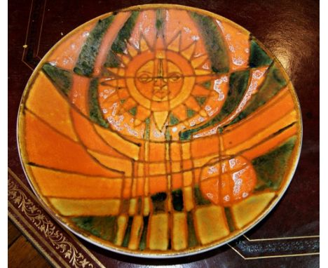 Poole shallow charger decorated in orange and green, Sun God pattern probably by Tony Morris, circa 1964-1967, 27cm