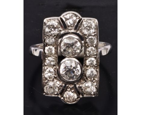 Art Deco style ring of square cut form with multi diamond setting,unmarked, the two central diamonds approximately .5 carats 