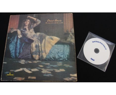 DAVID BOWIE- THE MAN WHO SOLD THE WORLD DRESS SLEEVE - An original UK pressing of the 1971 album with the withdrawn 'dress' s