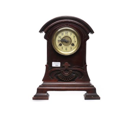 EARLY 20TH CENTURY MANTEL CLOCKmaker M.S. Jamieson of Kilmarnock, the yellow enamel face with Arabic numbers, above a scroll 