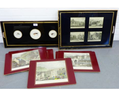 An ebonised rectangular tray with a glass top enclosing coloured engraved prints of Jesus College, Corpus Christie College, B