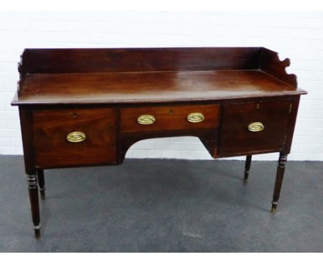 A mahogany ledgeback sideboard with an arrangement of three drawers, raised on ring turned supports,  97 x 155cm 