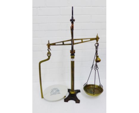A pair of late 19th / early 20th century Scottish Co-Operative Wholesale Society Limited brass and iron scales, complete with