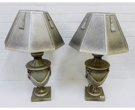 A pair of silvered resin classical urn table lamp bases and shades, 75cm high including shades, (2) 