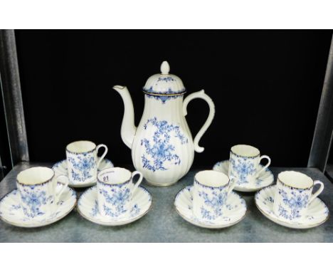 A Royal Worcester 'Mansfield' patterned blue and white porcelain coffee set comprising six cups, six saucers and a coffee pot
