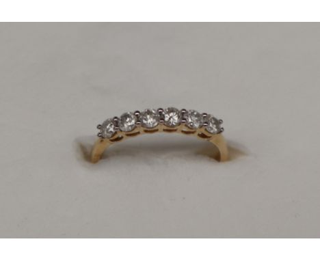 Gemporia - A 9ct gold Tomas Rae ring, set with round cut diamonds totalling 1/2ct, to a 9ct gold setting and shank, size L to