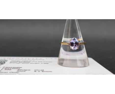 Gemporia - A 9ct gold tanzanite ring, set with oval tanzanite to a 9ct gold setting and shank, size L to M 