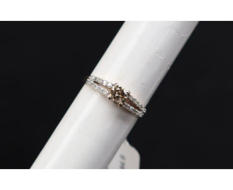 Gemporia - A 9ct gold diamond ring, set with round cut diamonds totalling 1/2ct, to a 9ct gold setting and shank, size L to M