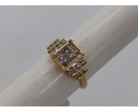 Gemporia - A 9ct gold Tomas Rae diamond ring, set with round and square cut diamonds totalling 1ct, to a 9ct gold setting and