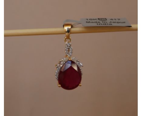 Gemporia - A 9ct gold ruby and white zircon pendant, set with pear cut Malagasy ruby and Marquise and round cut white zircons