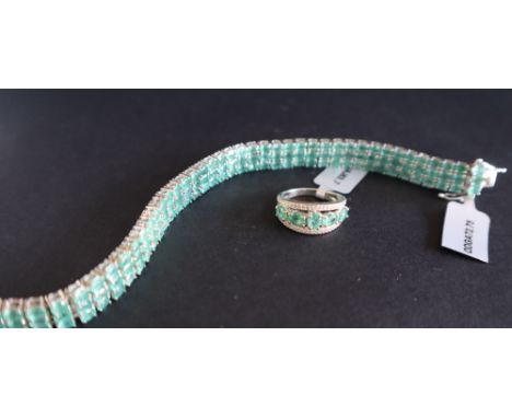 Gemporia - A sterling silver emerald bracelet, set with oval emeralds totalling 19.97ct, to a sterling silver setting, togeth