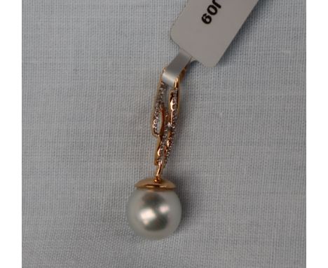 Gemporia - An 18ct cultured pearl and diamond pendant, set with round South Sea cultured pearl and round cut diamonds to an 1