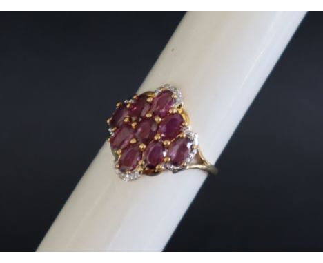 Gemporia - A 9ct gold ruby and diamond ring, set with oval cut Sant rubies and round cut diamonds, to a 9ct gold setting and 