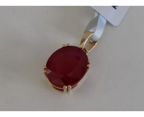 Gemporia - A 9ct gold ruby pendant, set with oval cut Malagasy ruby, to a 9ct gold setting