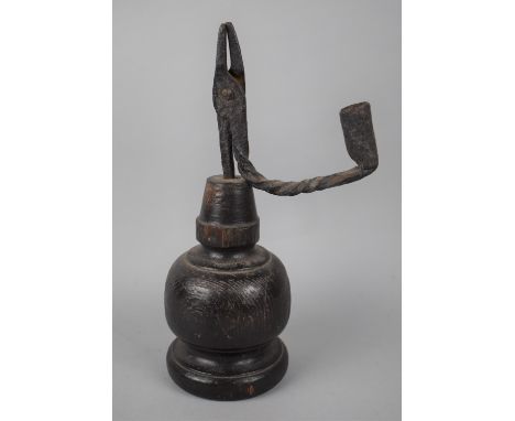 An Early English Wrought Iron Rush Light Mounted on Later Turned Oak Socle, 27cms High 