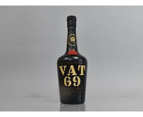 A Mid/Late 20th Century Novelty Advertising Cigarette Dispenser in the Form of a Bottle of VAT 69 Scotch Whisky Bottle, 21 Ci