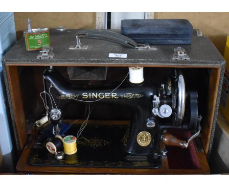 A Manual Singer Sewing Machine in Case with Accessories 