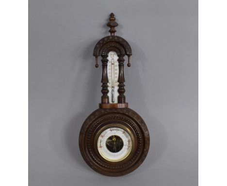 A Late Victorian/Edwardian Mahogany Wall Hanging Wheel Barometer with Temperature Scale, 40cms High 