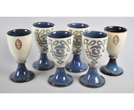 A Set of Six Glazed Stoneware Goblets with Celtic Motif, 13.5cm high 