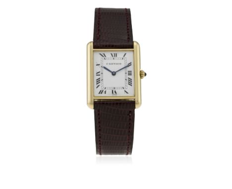 A GENTLEMAN'S 18K SOLID GOLD CARTIER TANK WRIST WATCH CIRCA 1990s
D: White dial with Roman numerals &amp; inner minute track,