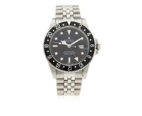 A GENTLEMAN'S STAINLESS STEEL ROLEX OYSTER PERPETUAL DATE GMT MASTER BRACELET WATCH CIRCA 1984, REF. 16750&nbsp;"TRANSITIONAL