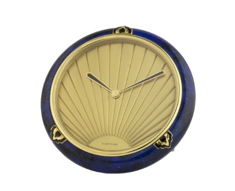 A RARE CARTIER DESK CLOCK DATED 1992, WITH ORIGINAL PAPERS
D: Gold sunburst effect dial. M: Quartz movement. C: Gilt metal ca