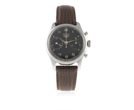 A RARE GENTLEMAN'S STAINLESS STEEL HEUER CHRONOGRAPH WRIST WATCH CIRCA 1950, RETAILED BY BAYLOR
D: Black dial with silver Ara