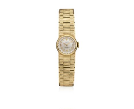 A LADIES 9CT SOLID GOLD ROLEX PRECISION BRACELET WATCH CIRCA 1960s 
D: Silver dial with gilt batons &amp; hands. M: 17 jewel 