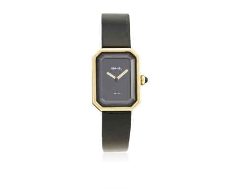 A LADIES 18K SOLID GOLD CHANEL PREMIERE WRIST WATCH CIRCA 2012
D: Black dial with gold hands. M: Quartz movement. C: Oblong c