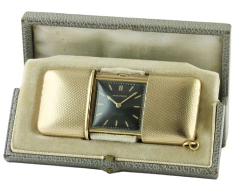 A RARE 9CT SOLID GOLD MOVADO EMERTO CHRONOMETER TRAVEL WATCH CIRCA 1930s, IN ORIGINAL FITTED BOX 
D: Black dial with gilt bat