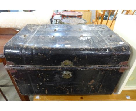 A tin steamer trunk