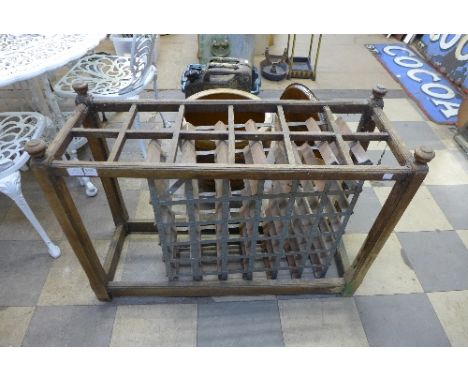 A Victorian oak stick stand and wine rack