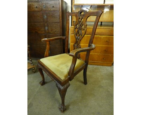 A 1920's Chippendale Revival mahogany elbow chair