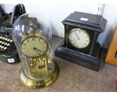 A 19th Century faux slate mantel timepiece and a Kaiser anniversary clock
