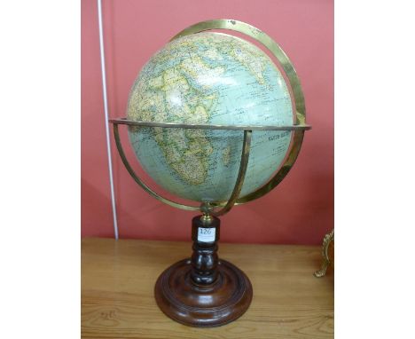 An early 20th Century French 10 inch terrestrial globe, Globe Metrique, E. Bertraux Editeur, G. Thomas suopt, 44 Rue N.D. des