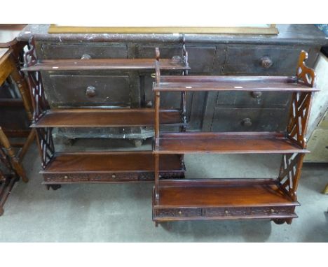 A pair of Chippendale Revival mahogany wall shelves